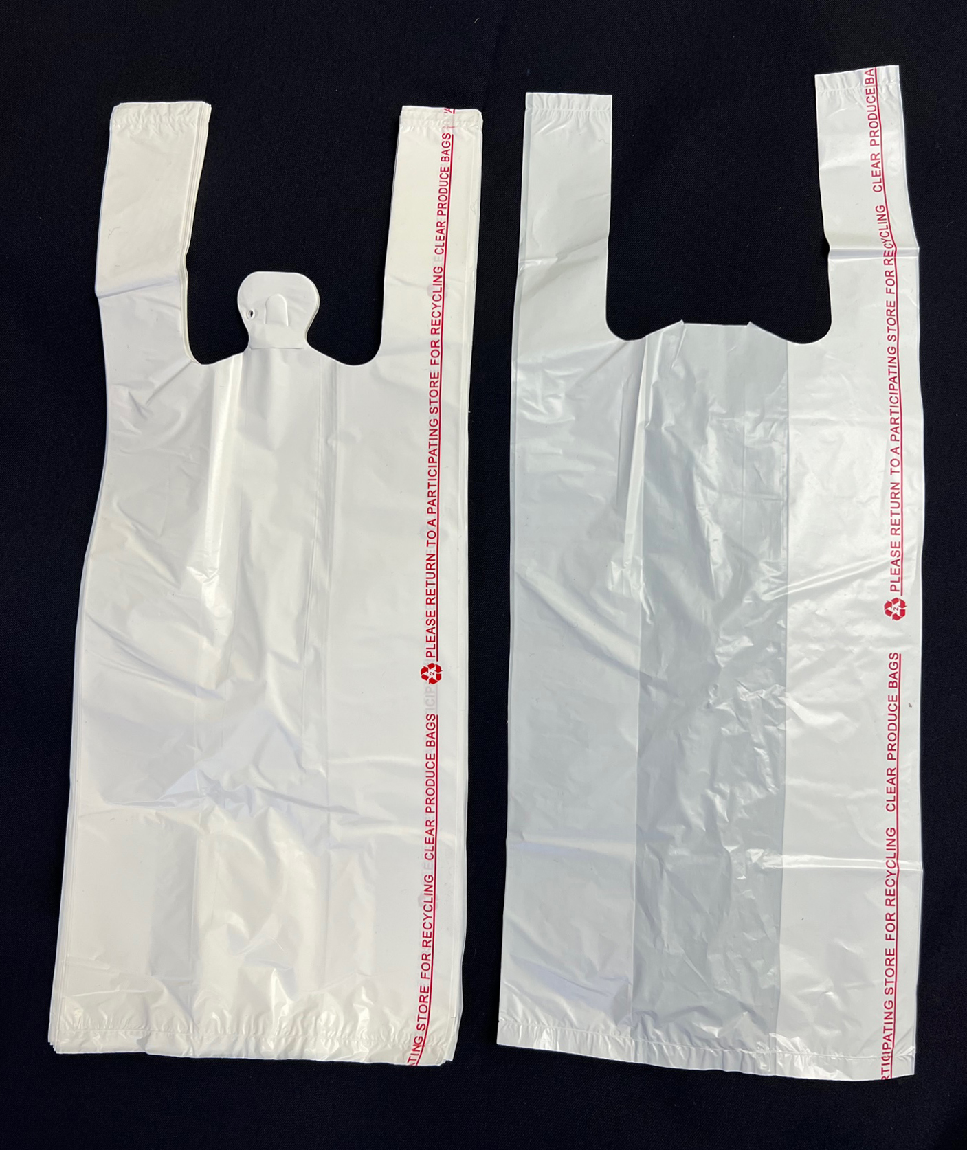17 x 7 x 18 CLEAR FROSTED LOOP-HANDLE PLASTIC BAGS - 3 mil
